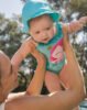Newborn girl swimsuit with solar protective hat