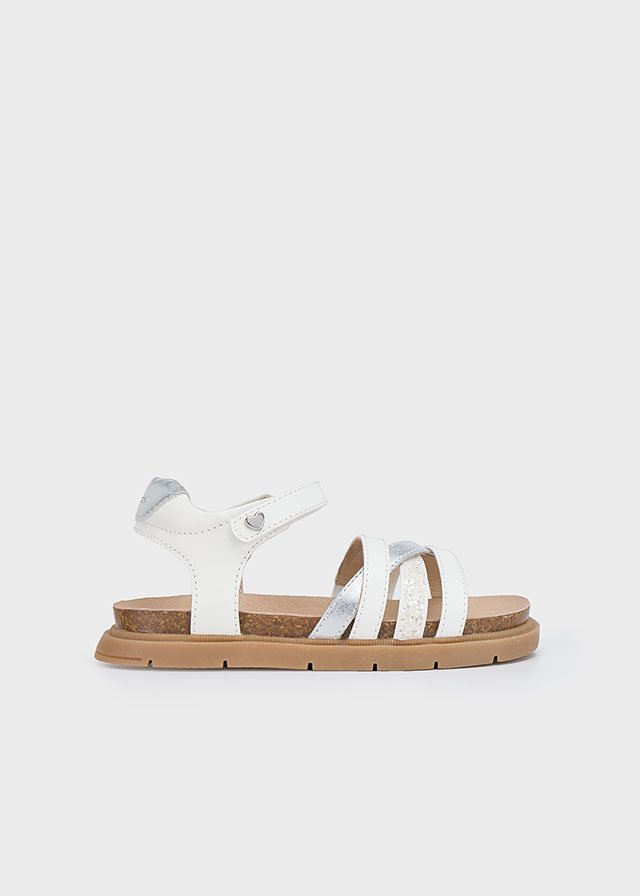 Girl sandals with serrated sole