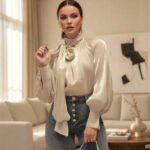 Shiny blouse with bow