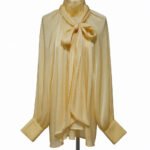 Shiny blouse with bow