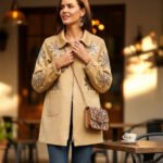 Trench coat with details