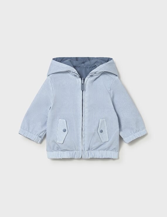 Reversible windbreaker for newborns