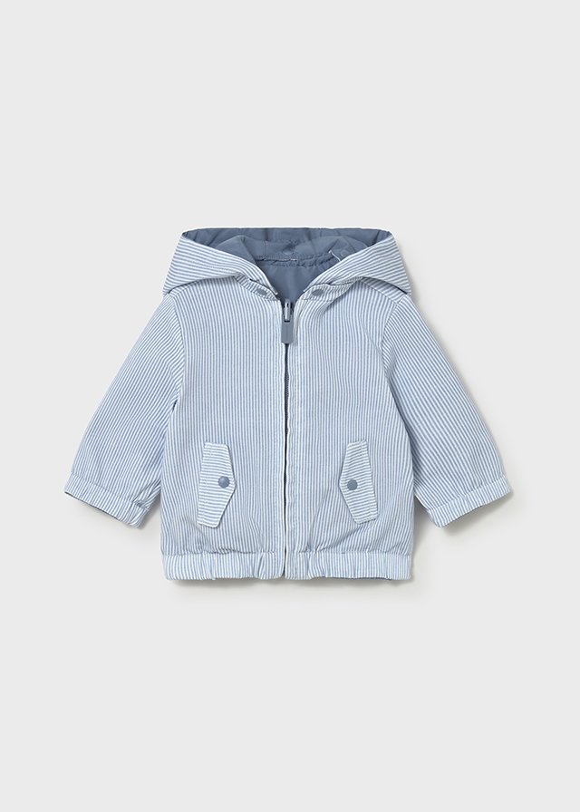 Reversible windbreaker for newborns