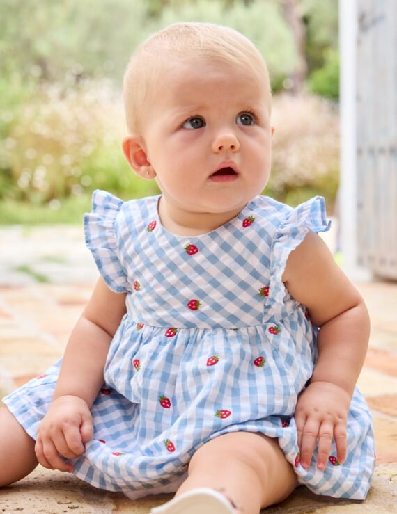 Dress newborn with nappy cover