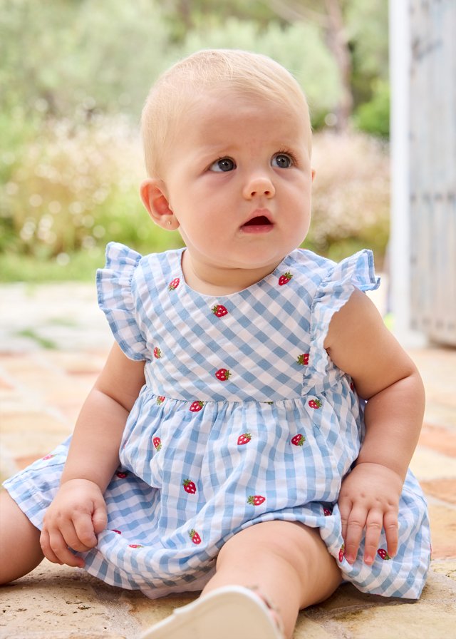 Dress newborn with nappy cover
