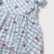 Dress newborn with nappy cover