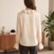 Silk ruffle blouse