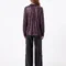 Shiny ruffle shirt